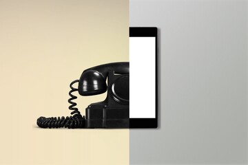 Old vs new technology. Retro phone and modern smartphone