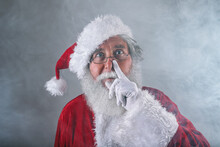 Santa Claus Laying A Finger Aside Of His Nose