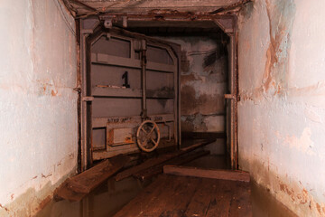 Wall Mural - a sealed door in a flooded shelter