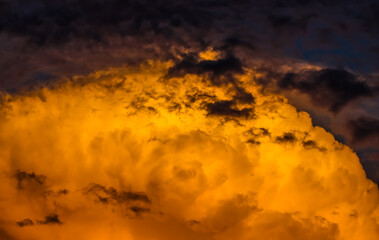 Wall Mural - Background from a bright colorful sunset with clouds. High quality photo