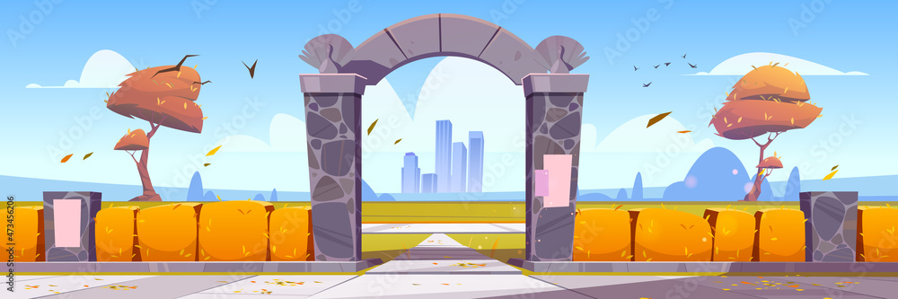 Autumn landscape with stone arch entrance to public park or garden ...