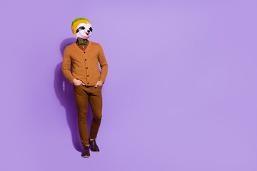 Sticker - Full length photo of slow freak sloth head person hands in pockets walking isolated on purple color baackground