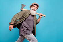 Profile Photo Of Funky Elder Man Wearing Khaki Shirt Cap Do With Wooden Axe Isolated Over Vivid Blue Color Background