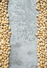 Wall Mural - pistachio nuts on stone surface