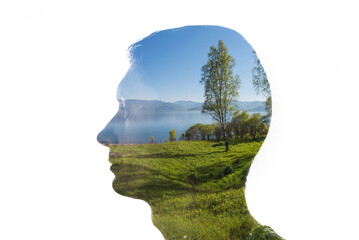 Wall Mural - Combination of a silhouette of a face and a landscape. Concept of the connection between man and nature