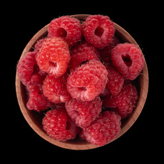 Wall Mural - raspberries on black background