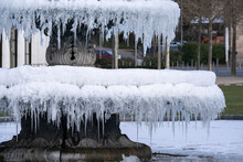 Close-up Of The Public Fountain In Wiesbaden / Germany At The Bowling Green Covered With Many Icicles 