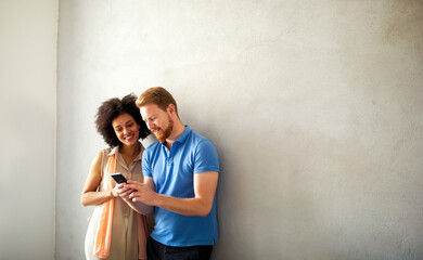 Portrait of happy success business people talking and having fun in office