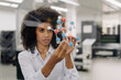 © Westend61 - Female entrepreneur examining molecule in industry
