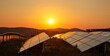 © Westend61 - Sun setting over solar farm