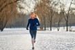 © Westend61 - Woman jogging during winter