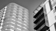 Abstract fragment of contemporary architecture. Residential area in the city, modern apartment buildings. Black and white. 
