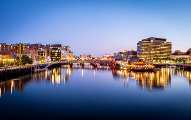 Boston in Massachusetts, USA showcasing the Boston Harbor and Financial District.