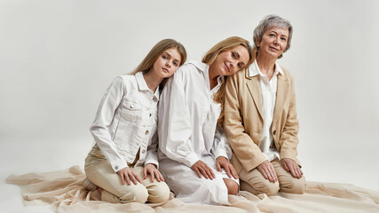 Wall Mural - portrait of three generations of women show support