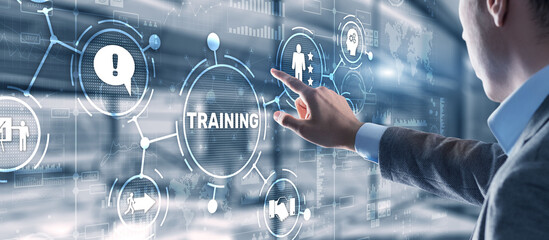 Trainning concept. Businessman pressing on touch screen interface inscription