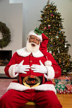 A Jolly Santa Claus Ho-ho-hoing And Laughing