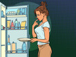 Beautiful woman near the open refrigerator with food