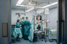 Group Of Doctors In Operating Room