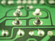 Failed solder joints. Cracked or broken solder joints, due to stress, fatigue, vibration. One of the common causes for vintage electronic equipment failures. Shallow DOF due to high magnification.
