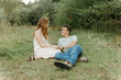 © Luke Liable/Stocksy - Couple together on the ground
