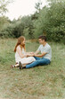 © Luke Liable/Stocksy - Couple laughing together on the ground