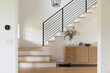© Raymond Forbes Photography/Stocksy - Foyer of Modern home  with stairsway