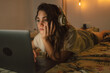 © Eloisa Ramos/Stocksy - Teen girl watching movie portrait