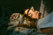 © Eloisa Ramos/Stocksy - Teen woman good looking on her bed