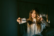 © Eloisa Ramos/Stocksy - Pretty teen woman taking a selfie at dawn
