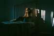© Eloisa Ramos/Stocksy - Beautiful teen woman calling at bedroom