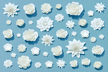White Paper Flowers On Blue Background. Cut From Paper.