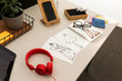 © Valentina Barreto/Stocksy - Fashion designer desk in studio