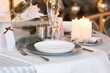 © Pixel-Shot - Dining table with setting for Christmas celebration indoors