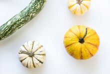 Pumpkins And Gourd On White