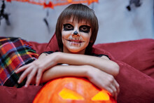 Teenager With Traditional Halloween Decoration