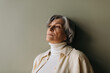 © Sergey Filimonov/Stocksy - Mature woman studio portrait