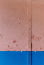 Texture Of An Old Pink And Blue Wall With A Metal Strip