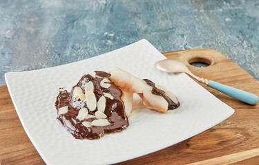 Sticker - Dessert with pears, dark chocolate and almonds. French gourmet cuisine