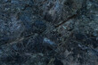 © Sonja Lekovic/Stocksy - dark blue rock background