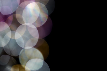 Wall Mural - blurred lights on a black background