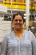 © Raymond Forbes Photography/Stocksy - Portrait of  worker at warehouse