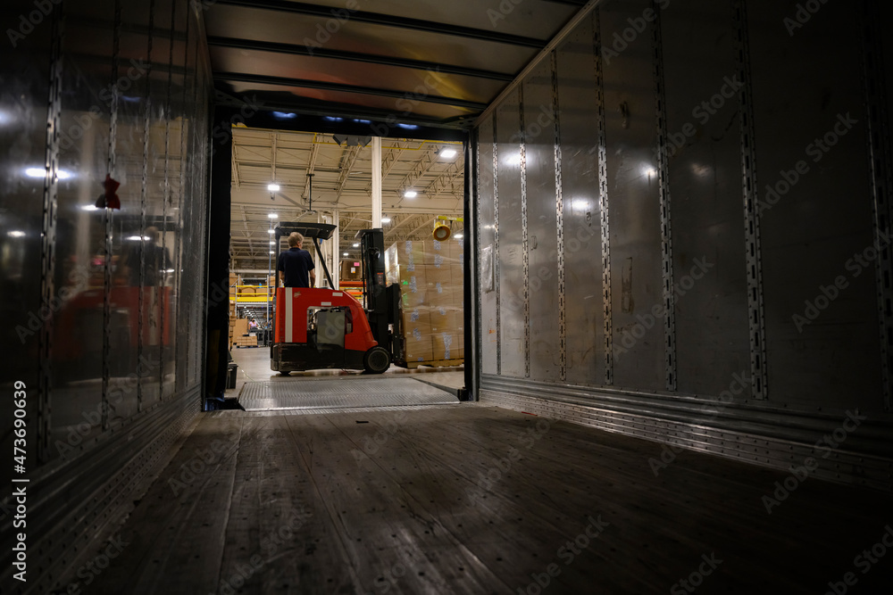 Moving freight with forklift Stock Photo | Adobe Stock