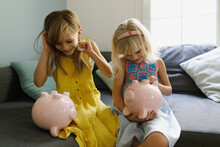 Kids With Piggy Banks