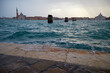 High tide floods wash over sea wall in Venice, Italy
