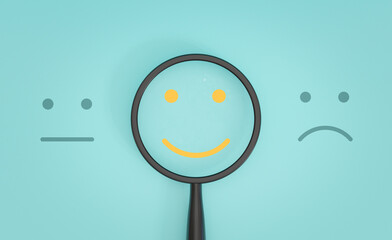 Wall Mural - Yellow smile face inside of magnifier glass between sad and normal emotion for focus positive emotion concept.