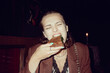 © Luciano Spinelli/Stocksy - Hungry girl eating a spinach pie at night