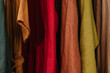 © Alina Hvostikova/Stocksy - Rack with linen clothes