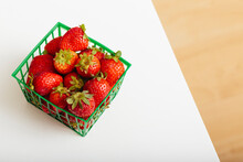 Studio Shot Of Basket Of Fresh Strawberries