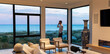 © Raymond Forbes Photography/Stocksy - Businessman  Talking on Cell phone inside Modern Luxury home
