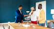 © BONNINSTUDIO/Stocksy - Clients shaking hands with attorney